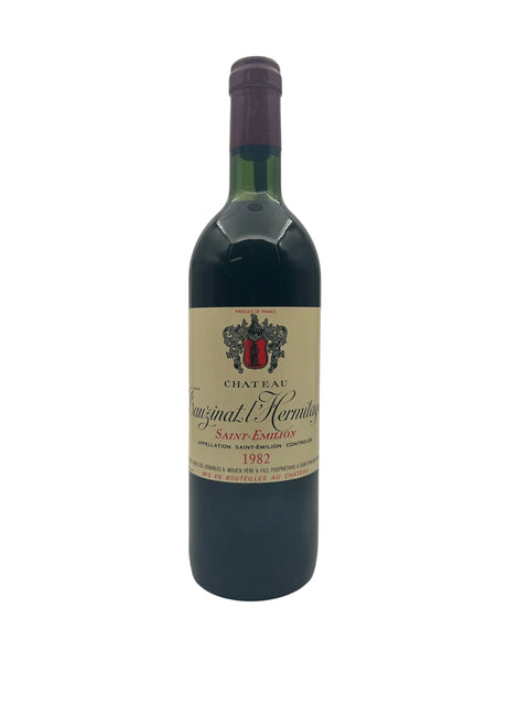 Flaske af Tauzinat l'Hermitage Château 1982 rødvin