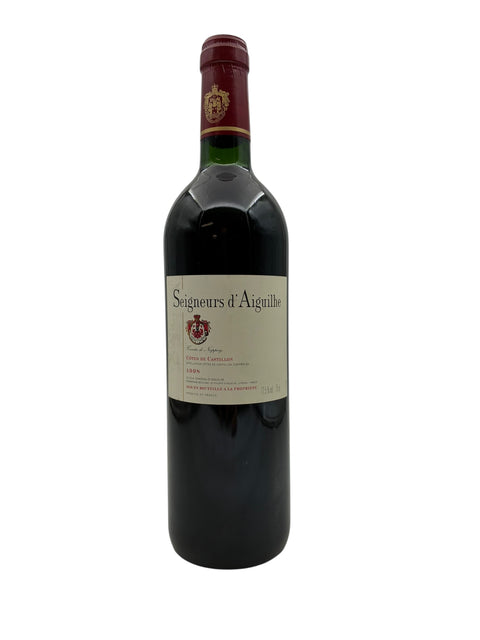 Flaske med Seigneurs d'Aiguilhe vin fra 1986