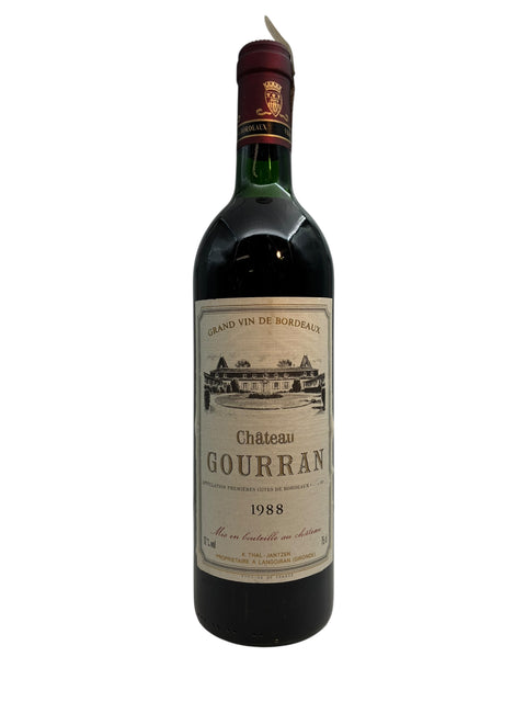 Flaske af Chateau Gourran 1988 rødvin med etikette