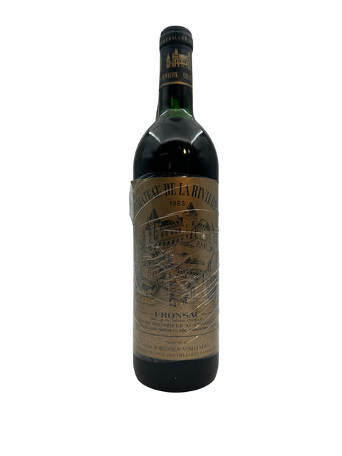 Flaske af Chateau de la Riviere 1985 rødvin