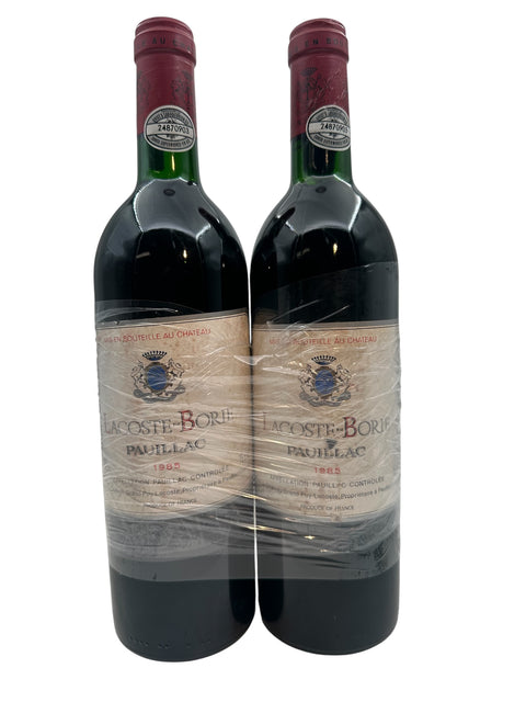 To flasker Lacoste Borie Pauillac rødvin fra 1985 fra Bordeaux-området