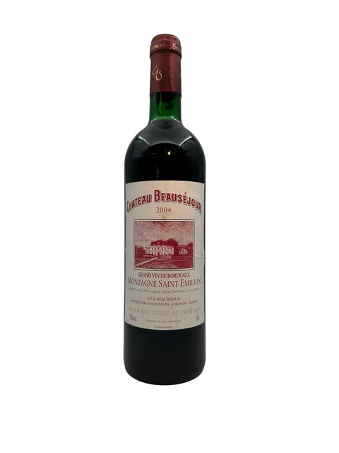 Flaske af Chateau Beauséjour 2004 rødvin