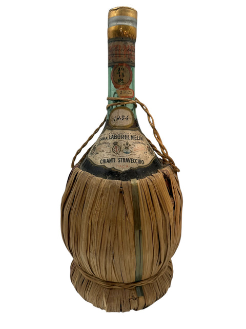Vintage Chianti Stravecchio flaskefodbundet i strå fra Melini 1934