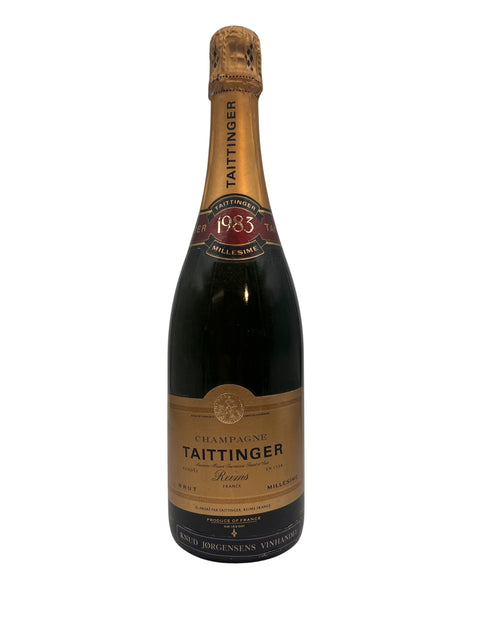 Flaske af Taittinger 1983 Champagne med elegant etikette